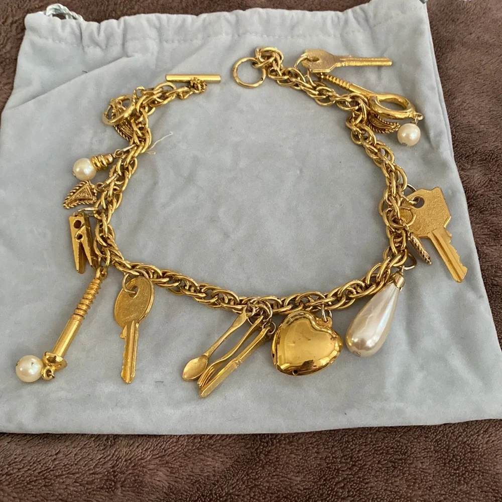 Vintage 1980s Rare Moschino Redwall 15 iconic brand gold charm necklace